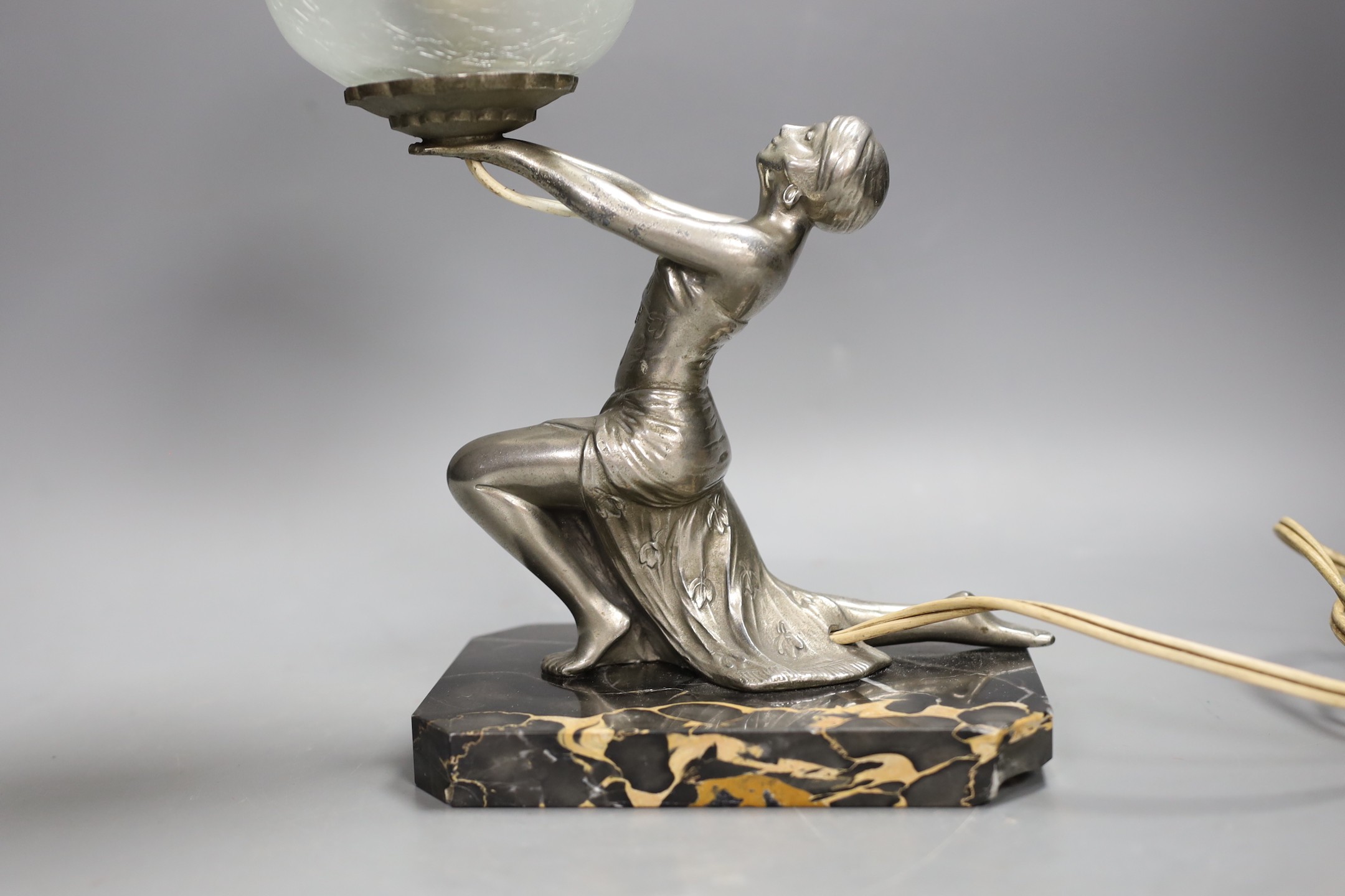 An Art Deco silvered metal figural lady lamp. 26cm high